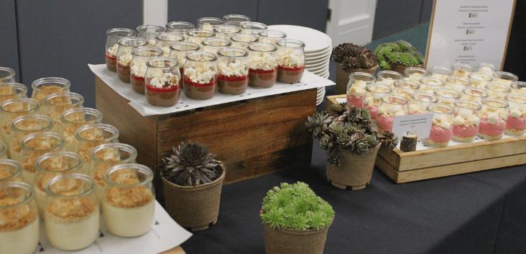 Three types of appetising desserts served in glasses, beautifully presented.